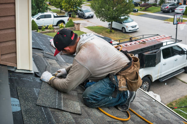 Professional Roofing technician working in West Point, UT